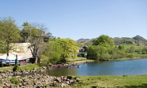 Canoes on Llynnau Mymbyr at Plas y Brenin