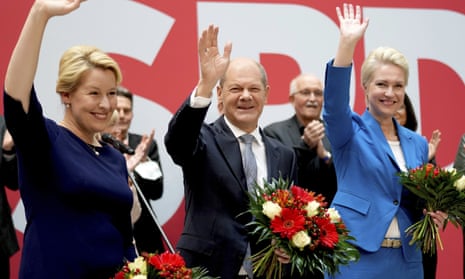 Olaf Scholz (centre) at the SPD headquarters in Berlin on Monday