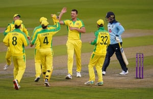 Josh Hazlewood celebrates as Jason Roy walks, out for three.