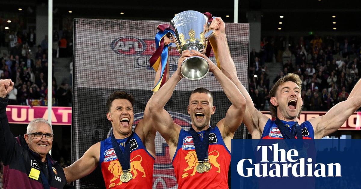 Photo: theguardian.com Brisbane Lions win AFL premiership after late surge against Fremantle