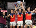 Brisbane Lions claim third consecutive AFL premiership at MCG