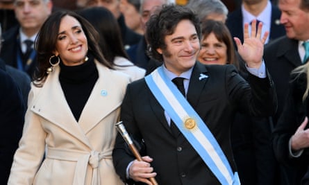 Easy to spot … Argentina’s president Javier Milei and vice-president Victoria Villarruel arrive at the Buenos Aires Metropolitan Cathedral, May 2024