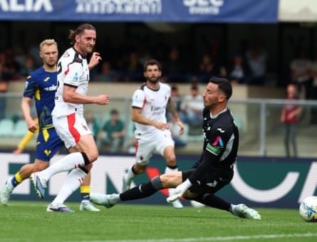 Milan’s Adrien Rabiot slots the ball past Verona goalkeeper Lorenzo Montipò