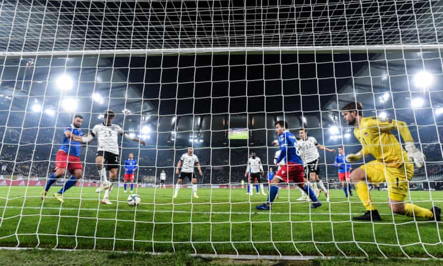 Thomas Müller scores for Germany in their 9-0 qualifying win against Liechtenstein.