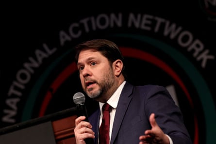 A man speaks into a microphone