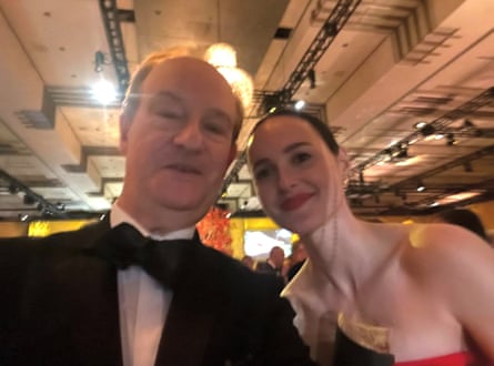 Peter Bradshaw in a black tux and Renate Reinsve.