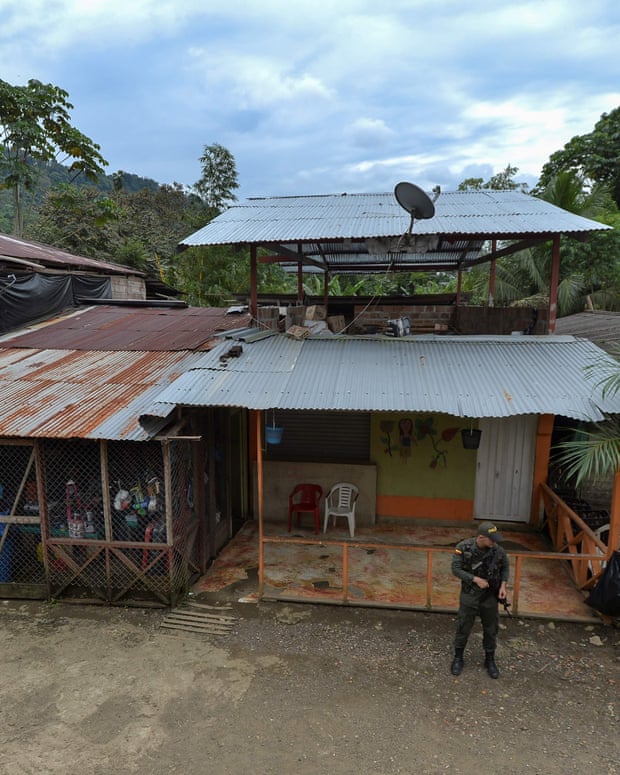 A police officer guards the streets of the town of Pie de Pato, Choco, western Colombia