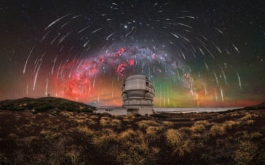 This winter Milky Way panorama captures a sky filled with Geminid meteors above the Gran Telescopio Canarias, the largest optical telescope in the world, on the island of La Palma, Spain