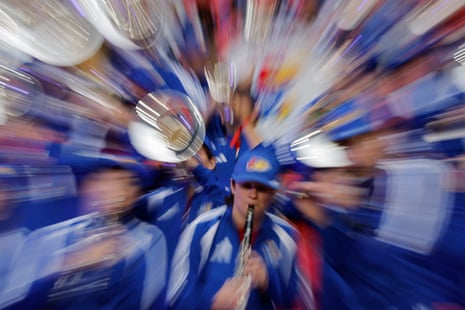 Kansas marching band playing in the stands.