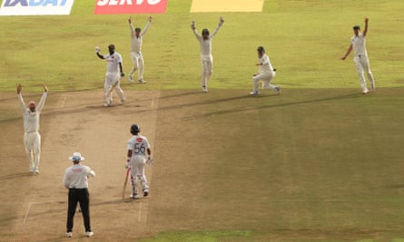 Nathan Lyon of Australia celebrates after taking the wicket of Angelo Mathews in Galle.