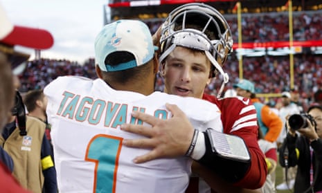 Brock Purdy hugs Miami Dolphins quarterback Tua Tagovailoa after the San Francisco 49ers’ victory on Sunday