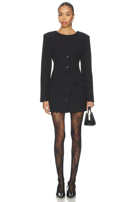 woman wearing black dress and lace tights