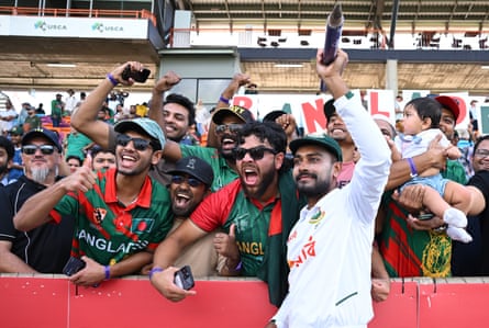 Mehidy Hasan Miraz of Bangladesh celebrates with fans after defeating Australia in Darwin