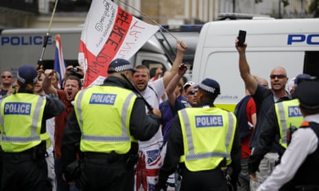 Police confront supporters of Tommy Robinson