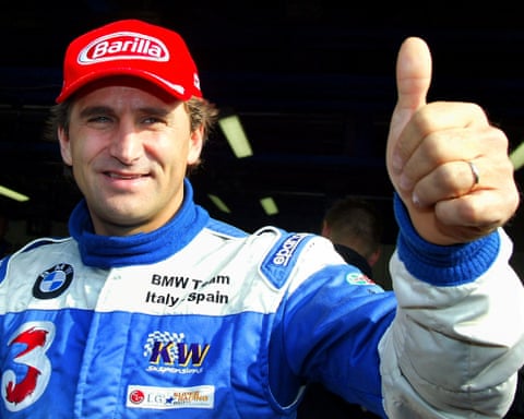 Alex Zanardi gives a thumbs up qhiukiqrihtprw