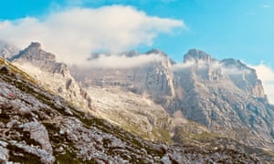 Dolomites at dawn, morning view of stratified towers on the way to via ferrata Francesco Berti.