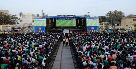 Senegal fans watch the match in a fan zone in Dakar.