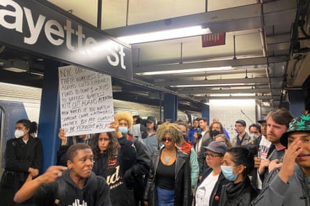 Protesters march through the Broadway-Lafayette subway station in New York.