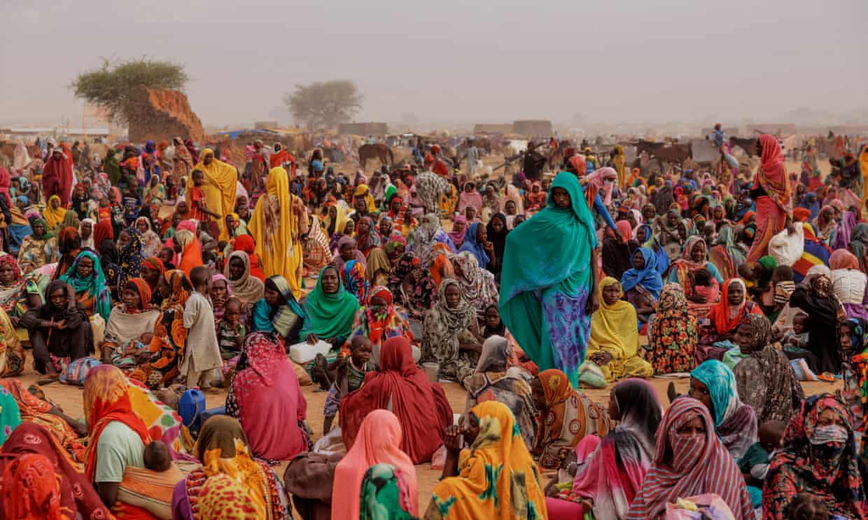 Refugees wait for a food distribution point to open at a camp in Adré, Chad, on 22 April. More than 8 million people have been displaced since fighting erupted between the RSF and Sudan’s military in April 2023. Photograph: Dan Kitwood/Getty Images