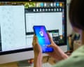 Person using AI chatbot in front of computer screen