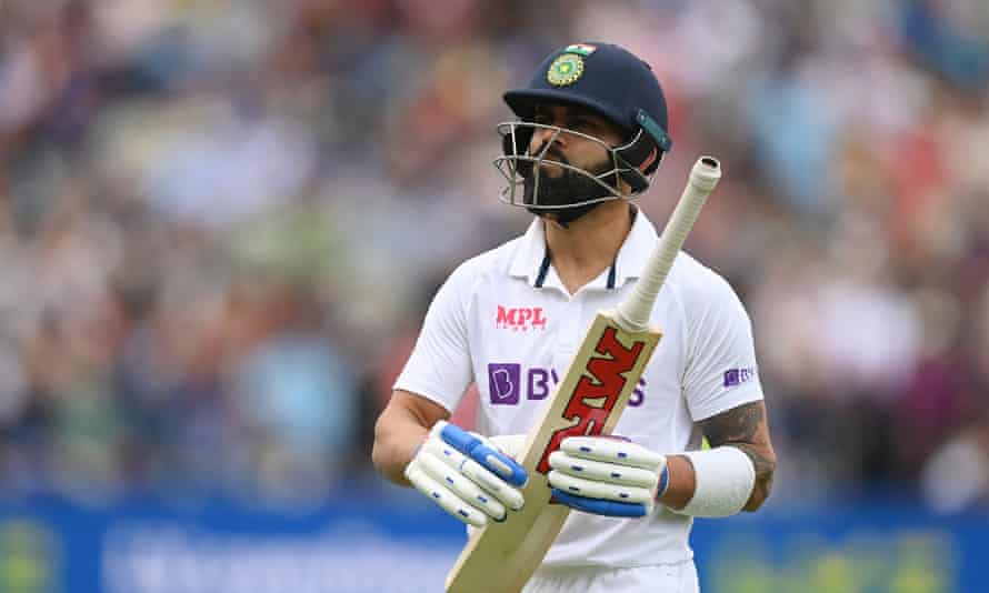 Virat Kohli of India walks off after being dismissed by England on day three.