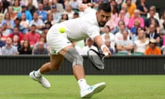 Novak Djokovic, with his knee brace, stretches to return against Vit Kopriva