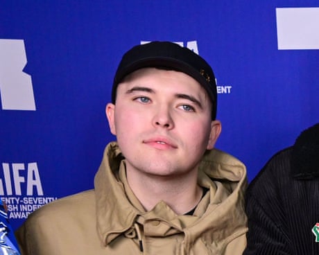 Kneecap’s Liam O’Hanna charged after allegedly displaying pro-Hezbollah flag at gig