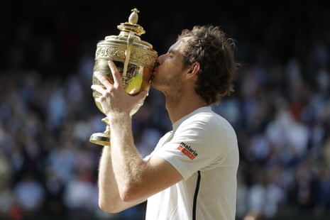 Murray kisses the trophy.
