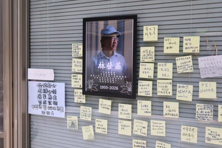 A poster of the late Lam Wing-kee and notes left by supporters are taped to the front of Causeway Bay Books.