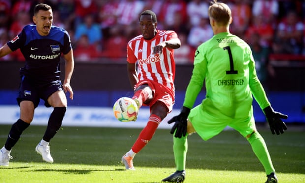 Sheraldo Becker fires home Union Berlin’s second goal in their 3-1 derby win over Hertha.