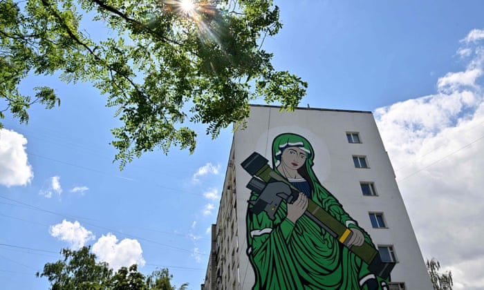 A mural created by Kailas-V creative group depicting a symbolic Madonna holding an anti-tank missile inspired by the “Saint-Javelin” project in Kyiv.