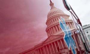 A view of the Capitol’s Rotunda is seen reflected in an ambulance in Washington DC.
