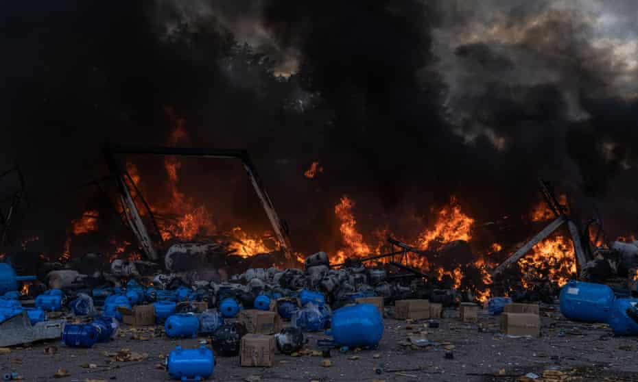 A fire at a warehouse after a Russian Kalibr missile was shot down over Kalynivka village in Ukraine on 8 March.