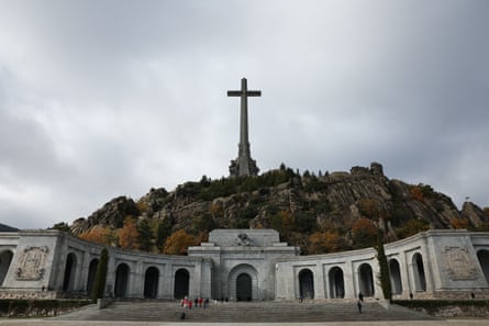 A 150-metre cross on a hill towers over the colonnade at the Valley of Cuelgamuros civil war memorial site.