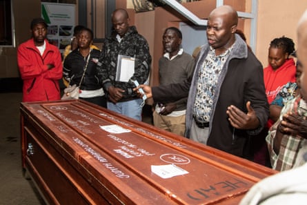 Mourners meet the coffin of Judith Adhiambo, a domestic worker reported to have died under unclear circumstances in Saudi Arabia, as it arrives in Nakuru, Kenya.