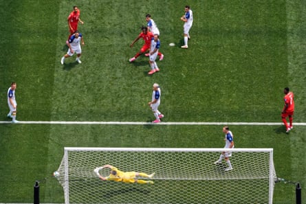 Switzerland’s Johan Manzambi watches his shot go into the net
