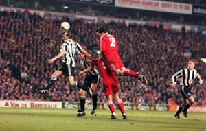 Ruddock heads at goal.
