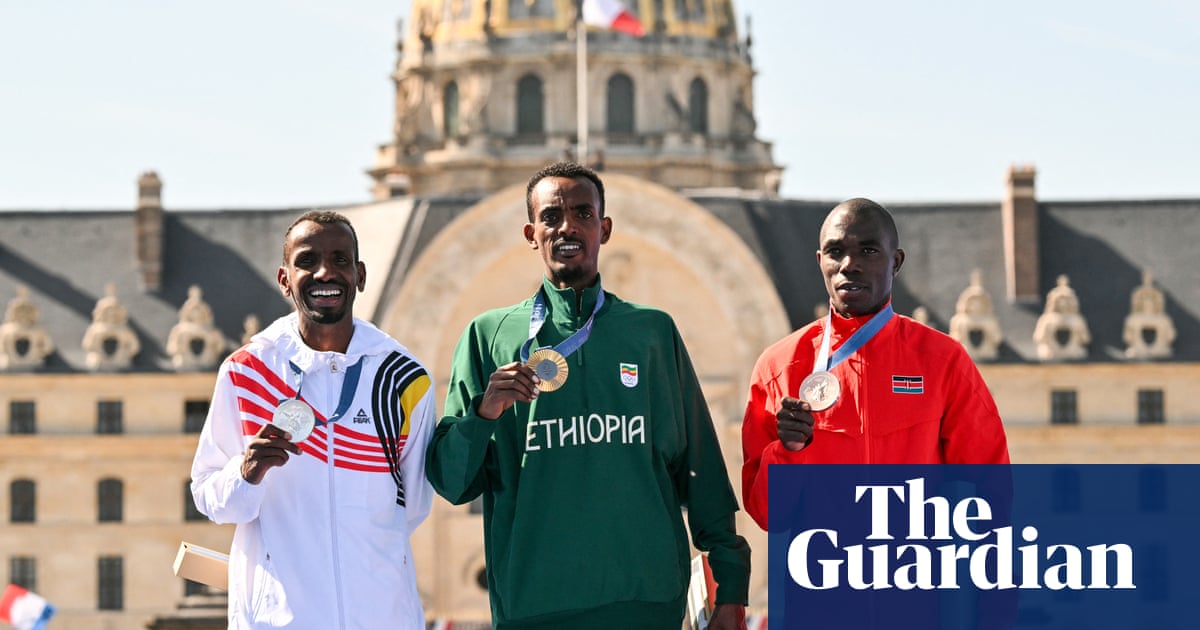Tola wins marathon