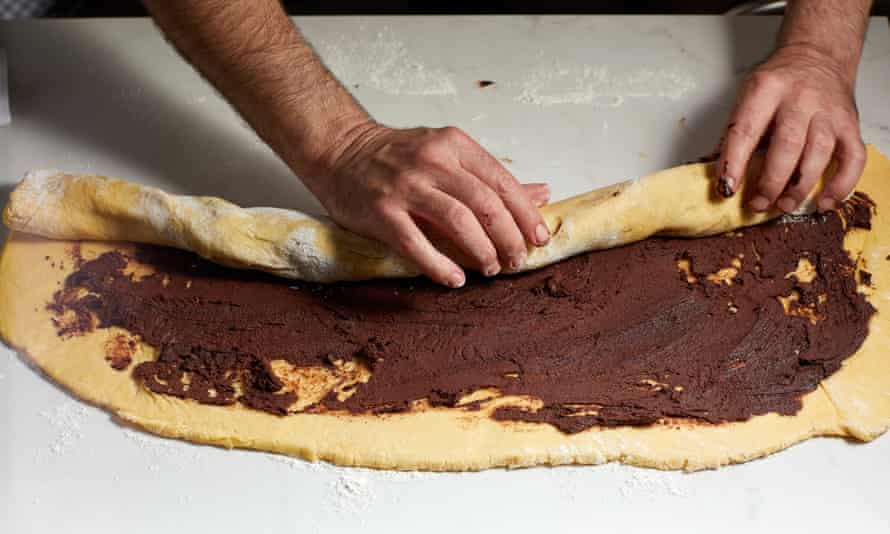 Rolling the chocolate dough into a sausage.