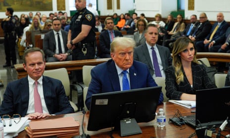 Flanked by his attorneys Chris Kise, left, and Alina Habba, Donald Trump waits to take the witness stand at New York supreme court on Monday.