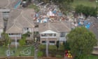 Australia news live: Sydney drenched with a month of rain in a day; search for woman continues after townhouse explosion
