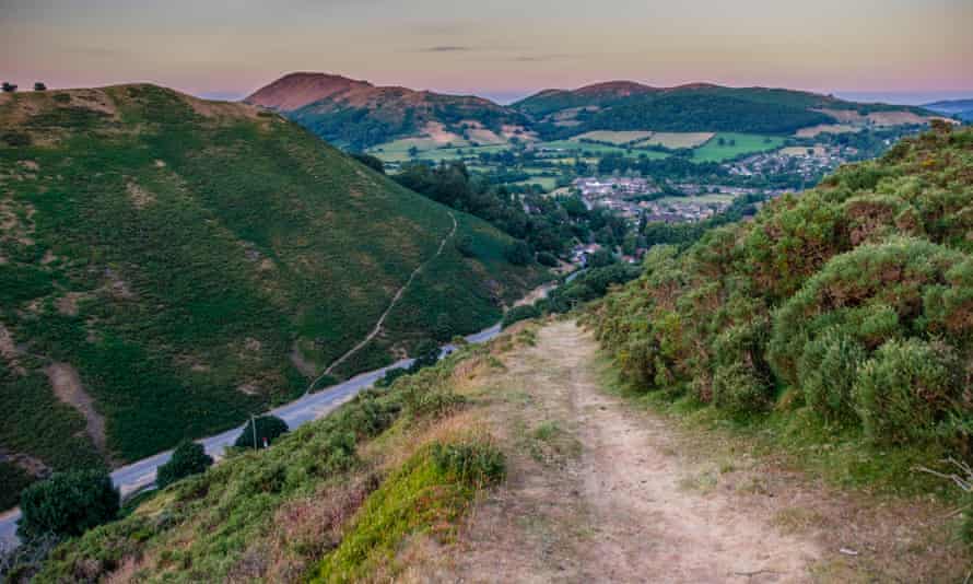 Spectacular sunset views of Carding Mill Valley and the Burway on the Long Mynd, with Hope Bowdler Hill and Caer Caradoc in the distance