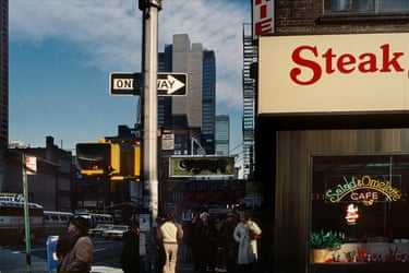 Manhattan, 1978 ‘A ‘Steak’ restaurant seen from outside at a busy street junction, distant skyscrapers rising in the background