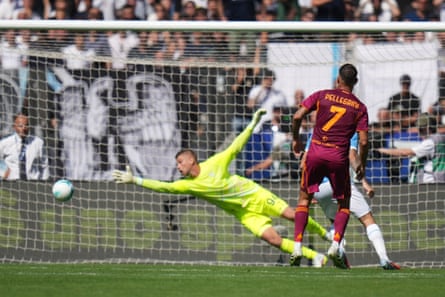 Lorenzo Pellegrini watches his shot fly past Lazio’s Ivan Provedel