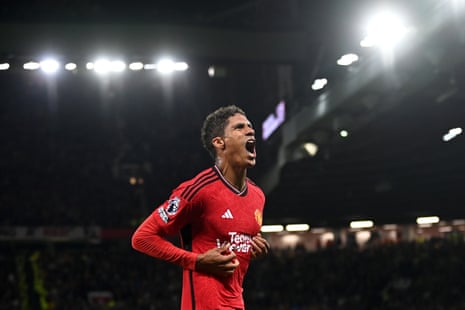 Manchester United’s Raphael Varane celebrates after heading the home side into the lead against Wolves.