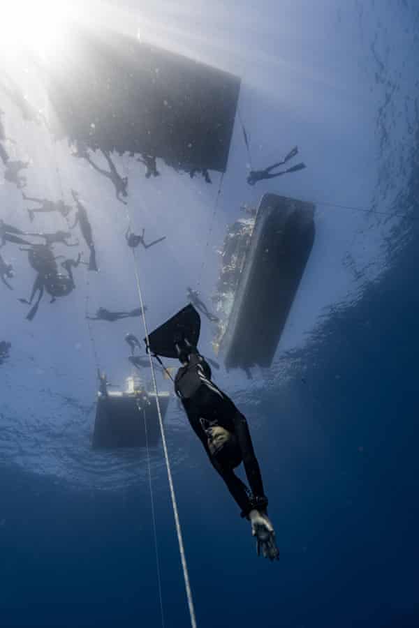 Free diver Amber Bourke diving underwater 