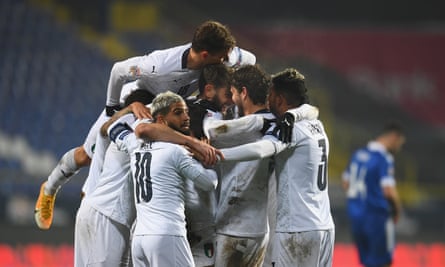Italy players celebrate Domenico Berardi’s goal in Sarajevo.