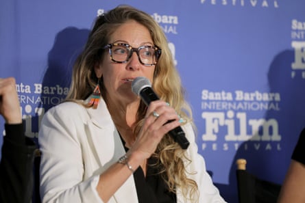 Nicole Noren speaks into a microphone during a film festival panel discussion
