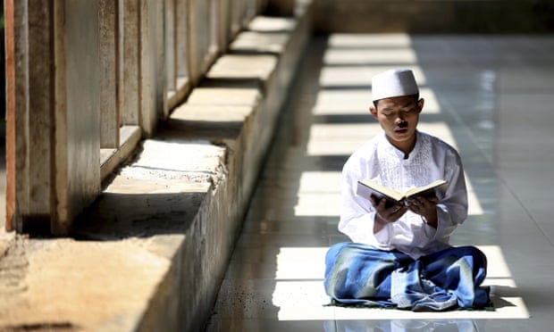 A student reads the Quran at the Al-Ashriyyah Nurul Iman Islamic boarding school in Indonesia, the largest Muslim-majority country.