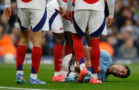 Manchester City’s Rodri yells in pain after sustaining what was later found to be a serious ACL injury against Arsenal at the Etihad Stadium